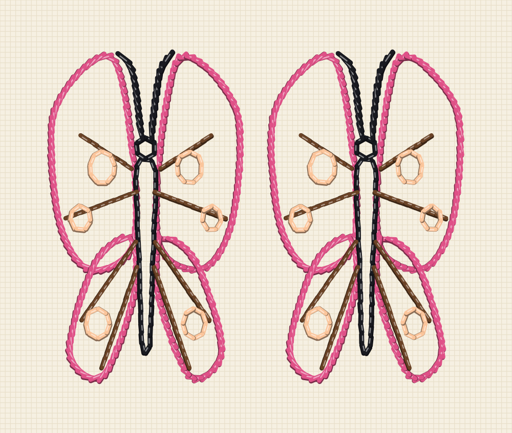 Pair of matching butterfly embroidery transfers with a clear blank gap between their antennae