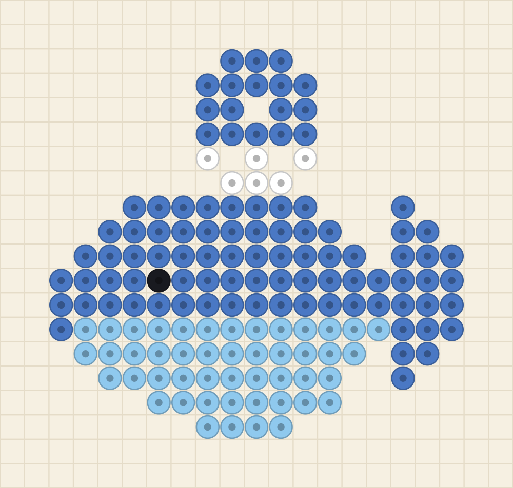 Perler bead keychain chart of a cornflower whale with a sky blue belly, tail flukes and a water spout